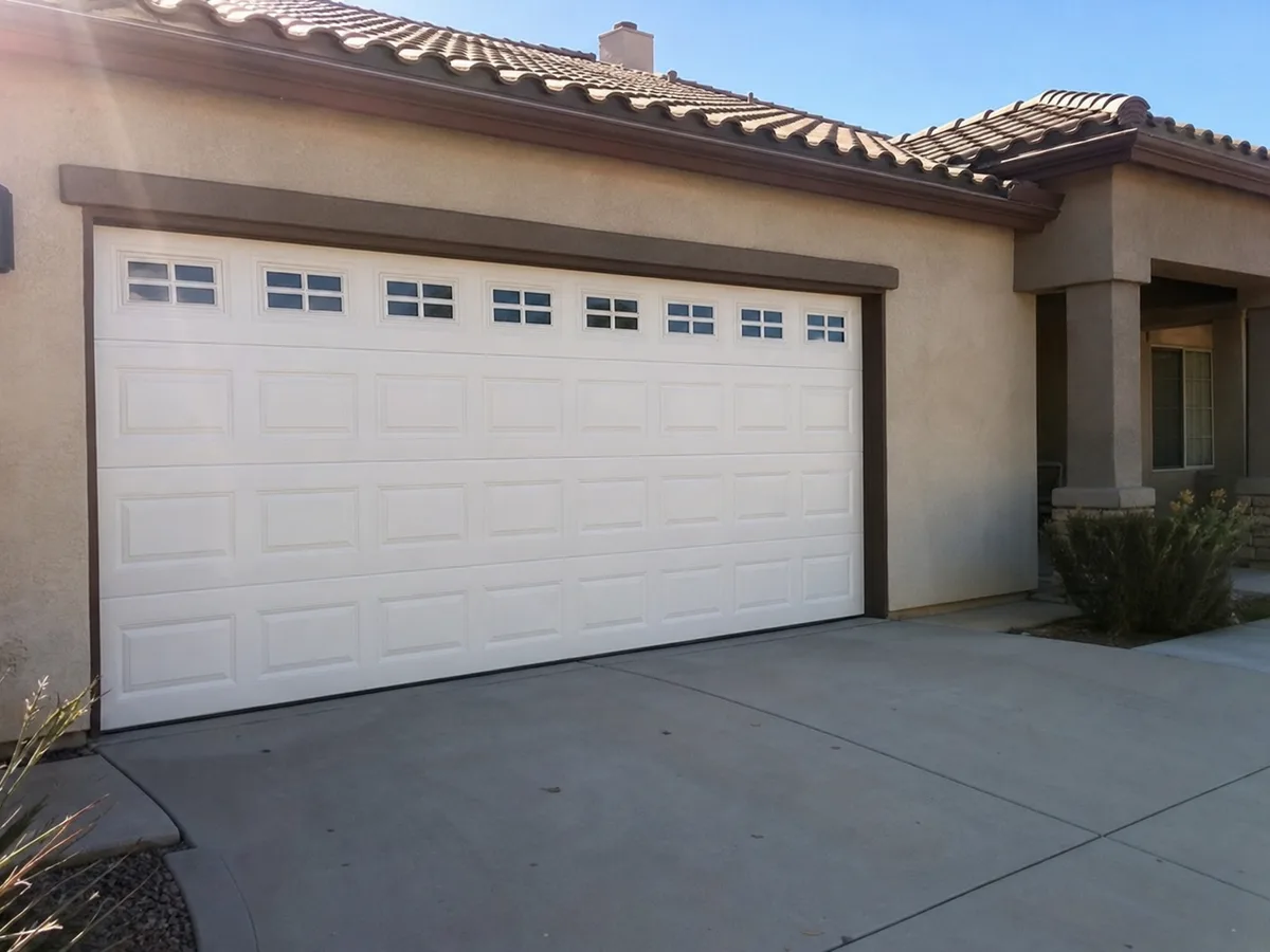 Newly installed garage door viewed from inside the garage — completed job in Amherst, MA